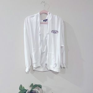 White zip up hoodie.